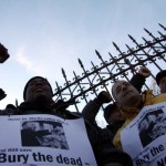 Woodlawn workers and supporters rallied to save their jobs two years ago after several cemetery employees accused management of racial discrimination. Now four workers have filed a lawsuit against the cemetery.. (Photo by David Greene)
