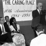 Dr. Robert Massad (at lectern) speaking at an event with former New York Gov. Mario Cuomo (seated, front row, left) in 1991. (Photo courtesy Montefiore Medical Center)