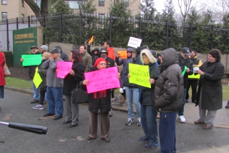 A CROWD OF shareholder tenants demonstrates outside Fordham Hill Oval Corp. demanding the ouster of Desiree Pilgrim-Hunter, the complex’s Board president. Photo courtesy Fordham Hill Owners Corp. Shareholders Derivative Suit Club