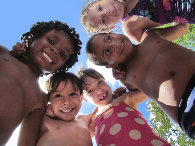 THESE KIDS AT MMCC’s day camp revel at a chance for a cute photo, and perhaps making some lifelong friends. Photo courtesy MMCC