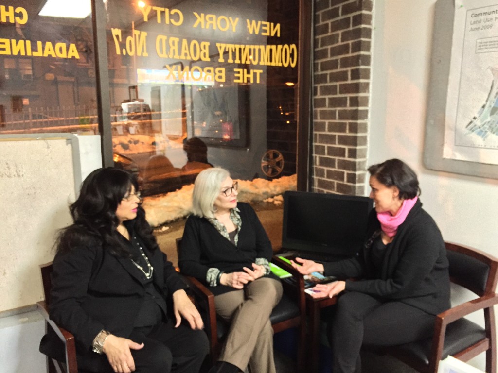 COMMUNITY ACTIVISTS (l-r) Adaline Walker-Santiago, Helene Hartman-Kutnowsky discuss the passing of Intro bill 126 with parent Marisol Carrero. Photo by Kimberly Jacobs