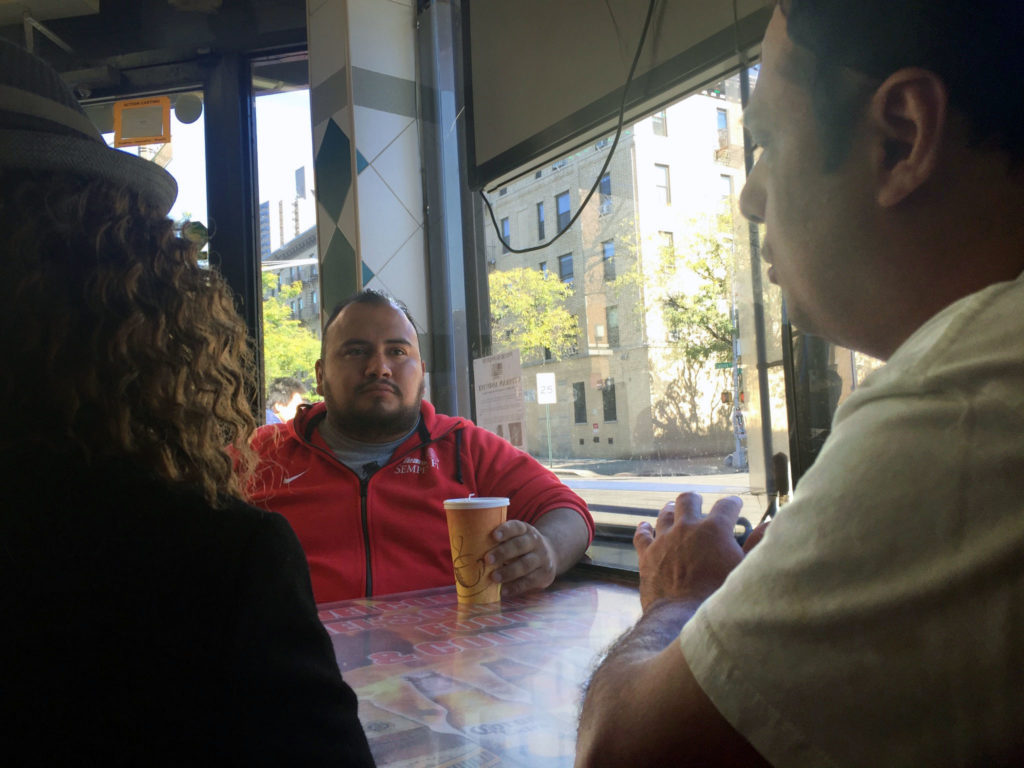 DEVIL DOG USA founder and Marine Sgt. Gonzalo Duran (center) chats with Angel Garcia (right), owner of Angel’s, and Estrella Diaz, a local business owner.  Photo by David Cruz 