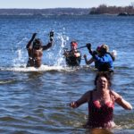 SEE PICTURES: Bronx Polar Bears Take Orchard Beach Plunge